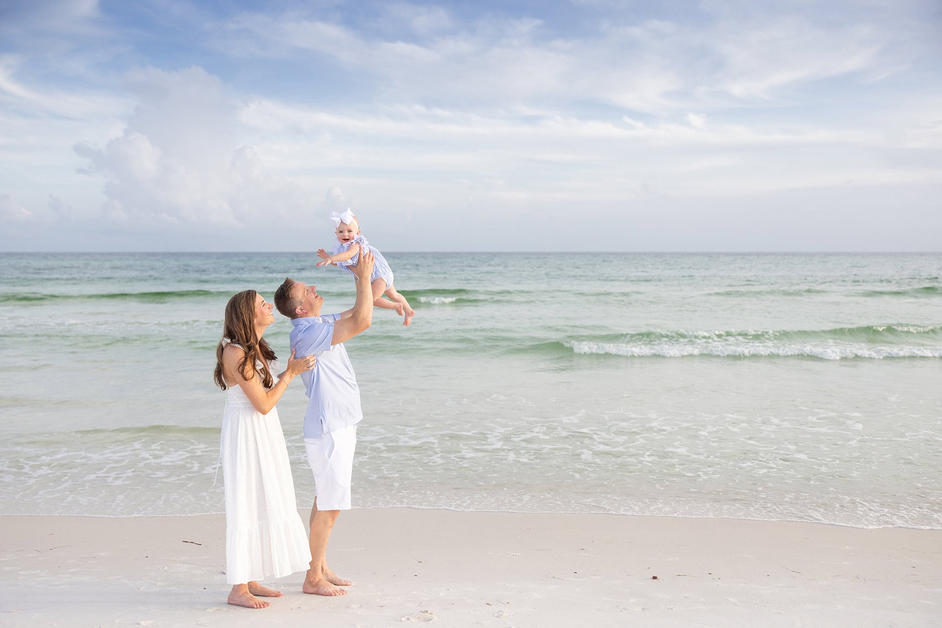 Family on the beach photographed by 30A Photographers, Modernmade Photography.